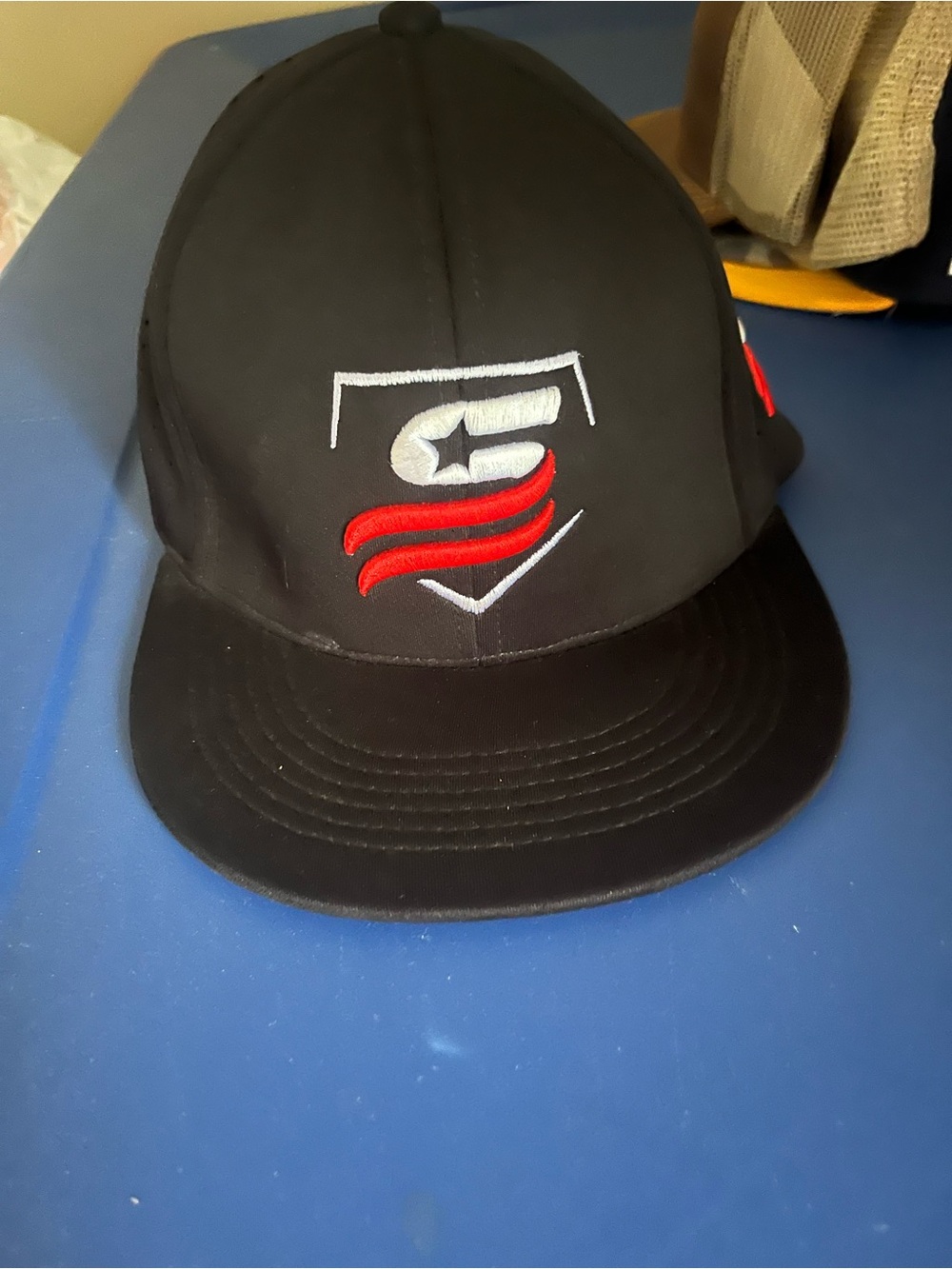 Black Snapback Hat with White & Red Embroidered Shield Logo